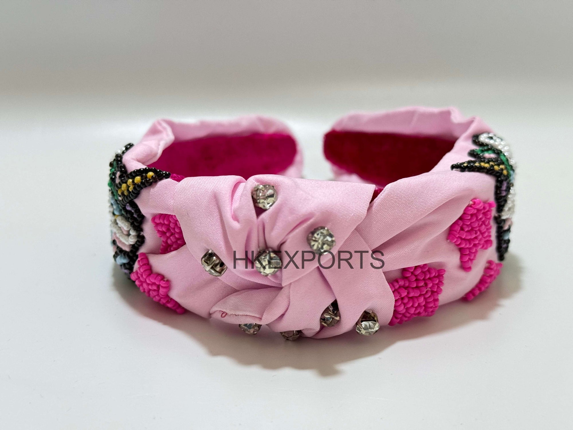 Elegance in Beads: Pink and White Rhino Handmade Beaded Headband